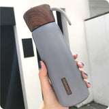 Gourde isotherme inox et bois grise