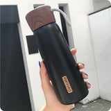 Gourde isotherme inox et bois noire