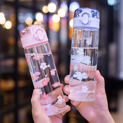 Gourde en verre motif fleur avec paille
