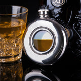 Flasque en verre et inox
